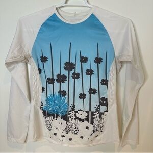 Sugoi women’s athletic floral long sleeve shirt. Size medium
